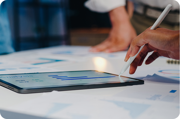 Business professional working on a tablet, focused on growing their company